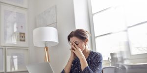 Tired Stressed Businesswoman At Laptop With Head In Royalty Free Image 742168607 1548685874